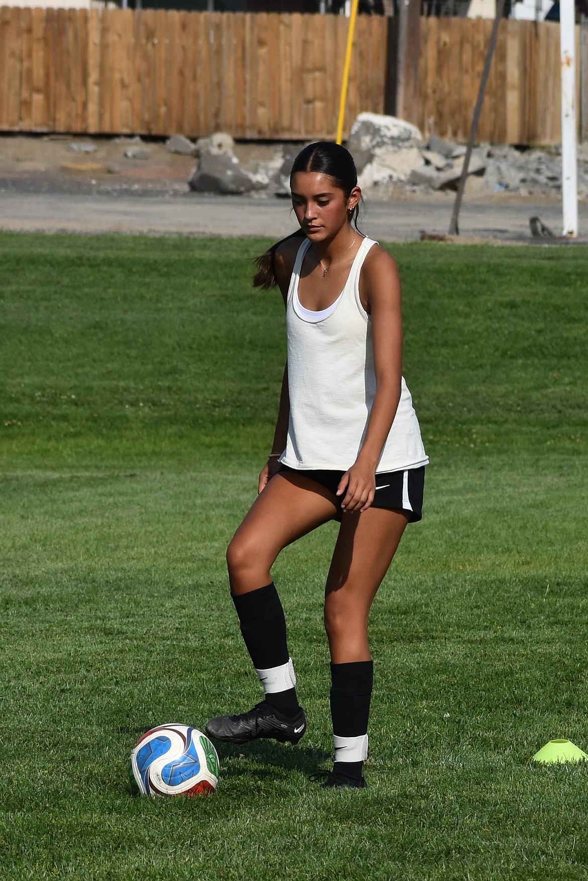 Khloe Valdez from Othello maneuvers the ball as she works to pass to her teammate at practice this season.