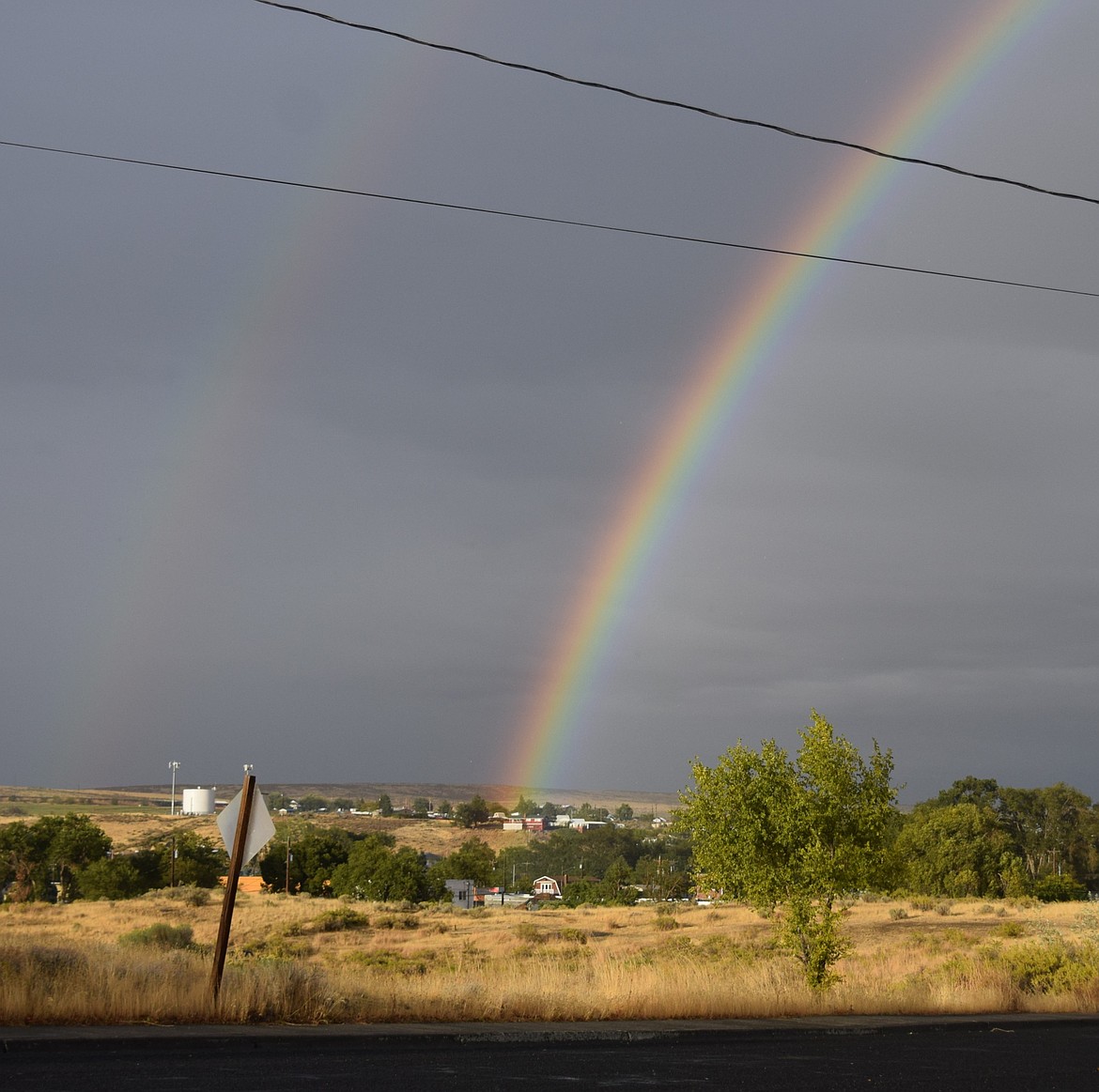 Two rainbows arch over Soap Lake as seen from the Senior Center.