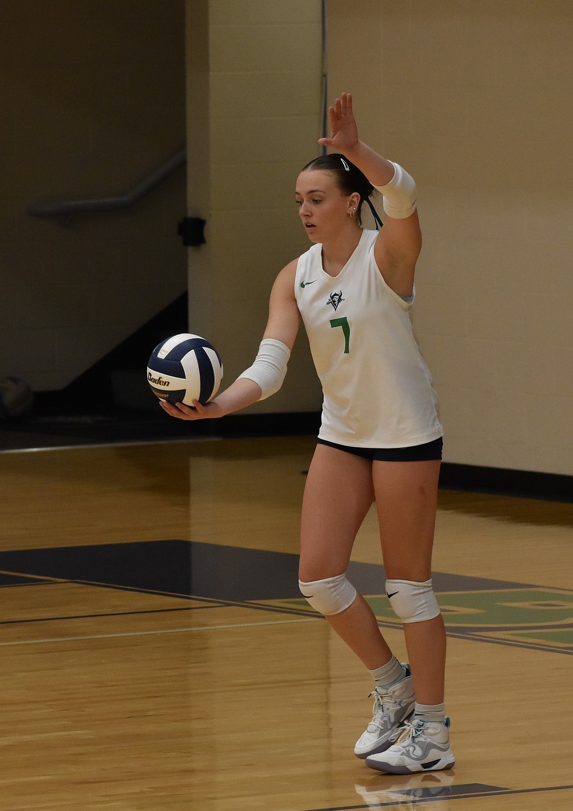 Vikings’ Kaylee Lindley steps up to serve the ball during Friday’s game against Highline.