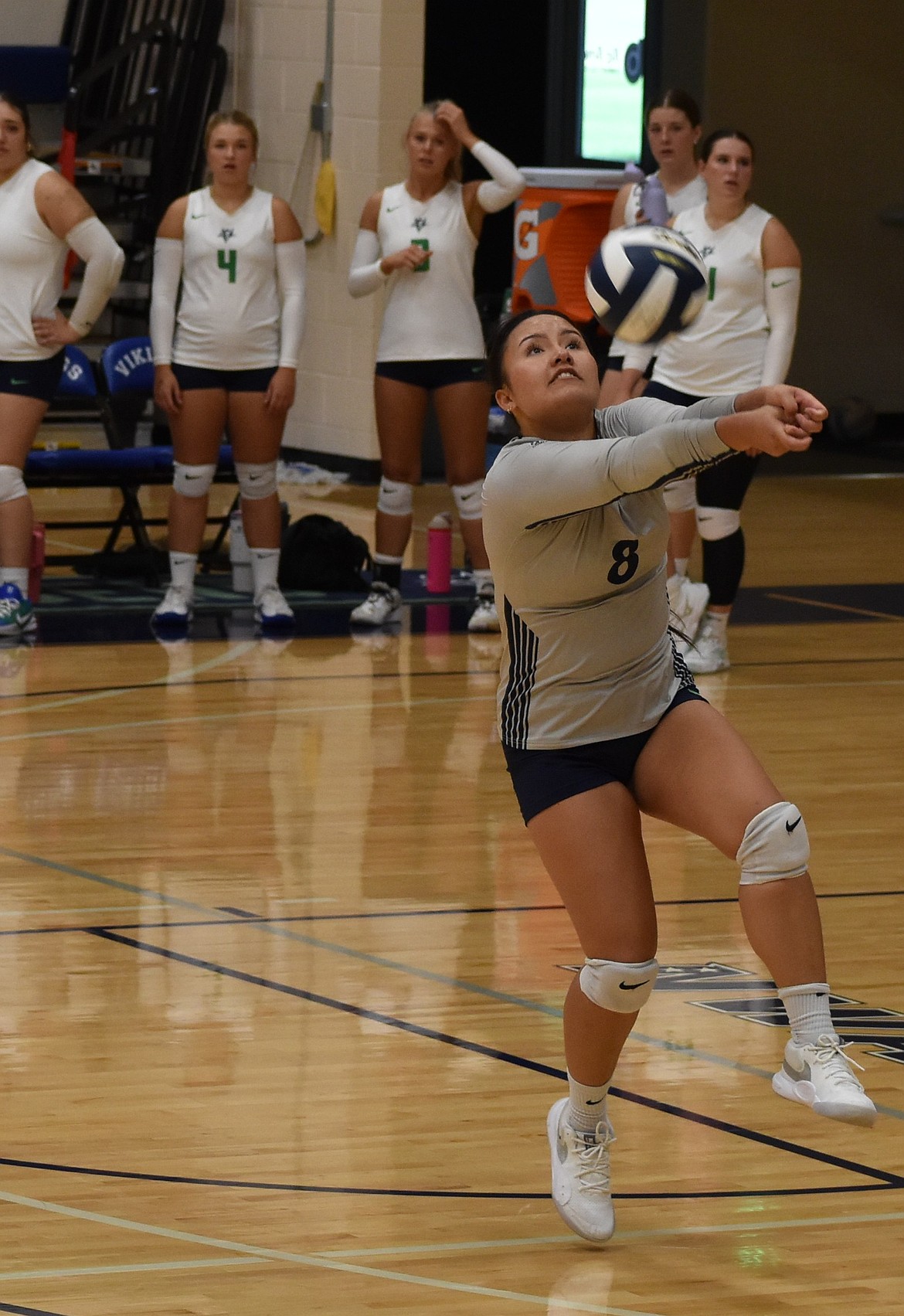Jah Chong from the Vikings connects with the ball to hit it over the net back towards the opposing Highline team Friday afternoon.