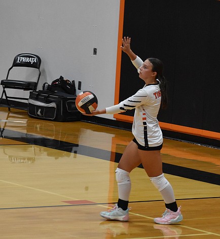 Ephrata’s Staci Guerrero gets ready to serve the ball during the Tigers’ home opener last week. The Tigers head on the road to face the Mavericks this week.