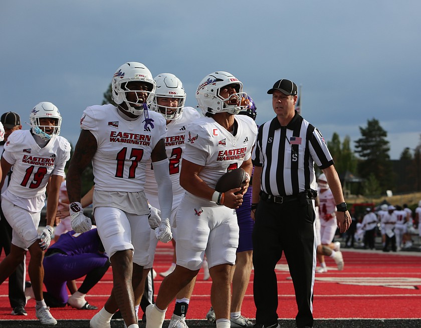 Nate Bell (2) celebrates a rushing touchdown with his teammates against the University of Northern Iowa Saturday. Eastern Washington defeated UNI 34-24 at home.