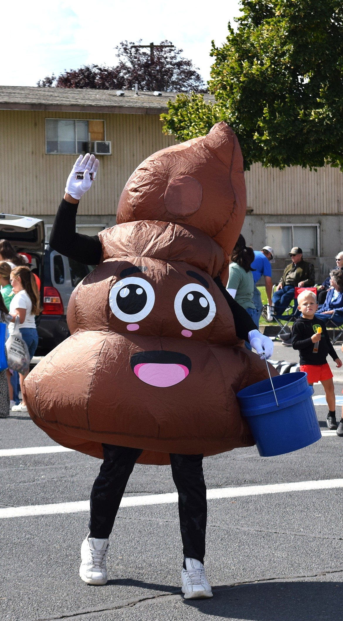 A larger-than-life mascot strolls down Main Street Monday with a reminder not to flush so-called “flushable” wipes, which continue to create problems in Warden's sewer system.