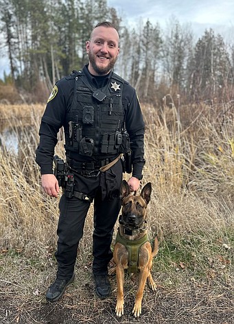 Grant County Sheriff's Office's K9 Storm, shown with her handler Gunnar Hinds, led officers to a woman who allegedly stole a cat a knifepoint Monday.
