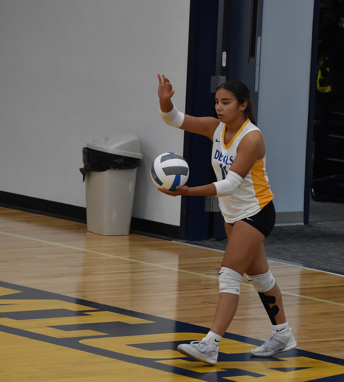 Debi Horn from Wilson Creek steps up to serve the ball during Tuesday’s road game against MLCA.