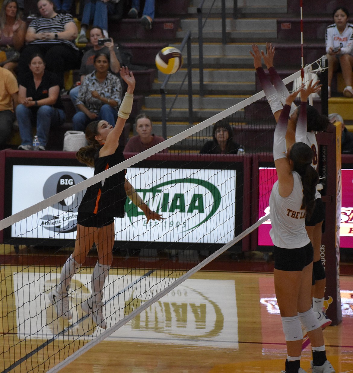 Ephrata sophomore Scarlet Wolther bumps the ball back over the net through a block from Moses Lake Tuesday evening.