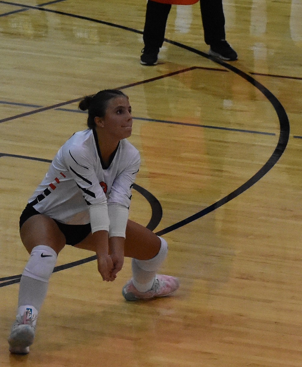 Staci Guerrero, a sophomore for the Tigers, prepares to respond to a serve from the Mavs Tuesday.