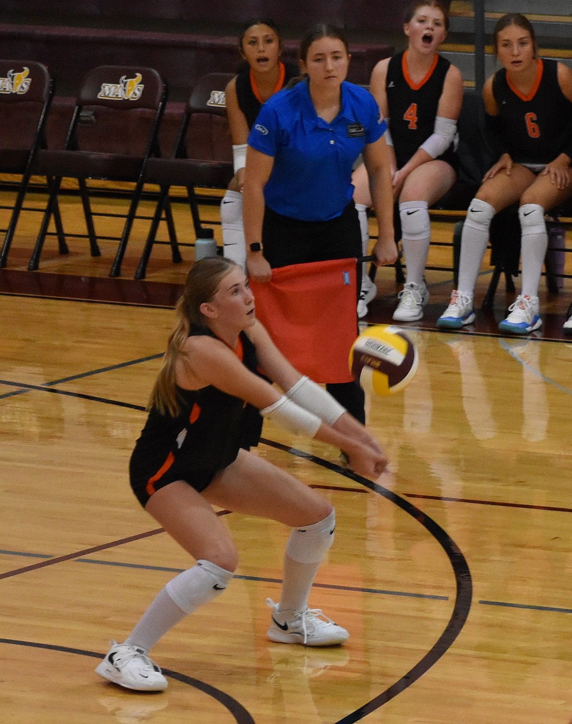 Tigers sophomore Sidney Chornuk responds to a serve from the Mavs and bumps the ball up to set up for a kill.