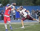 Coeur d'Alene wins big again — Comstock, whose season ended early last year due to injury, catches two of Stern's five touchdown passes
