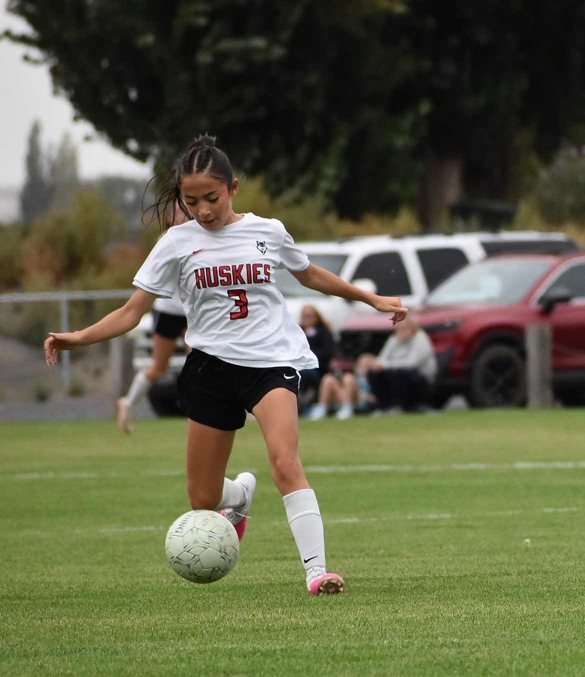 Bella Garza from Othello moves the ball downfield as she makes her way toward the goal Thursday evening.