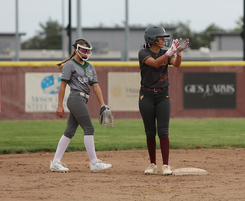 Aliana Deleon (24) claps to the dugout after making it to second base for the Mavericks.