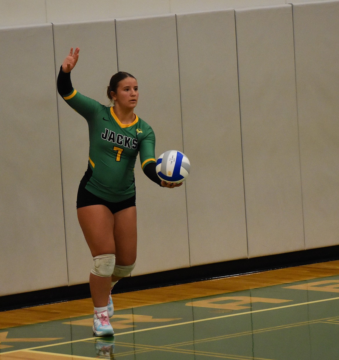 Jacks freshman Gabby Bergman steps up to serve Tuesday evening as Quincy hosted the Tigers.