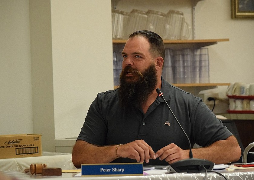 The Soap Lake City Council unanimously approved a consulting contract, with Mayor Peter Sharp opposing the decision saying it was a violation of the separation of powers between the mayor and council.