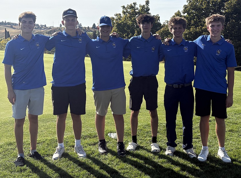 Courtesy photo
The Coeur d’Alene boys won the Moscow Invitational on Monday at the Vandal Golf Course. From left are Drew Murrell, Kellan Christensen, Cole Paquin, Damon Mysse, Max Gage and Hunter Paquin.