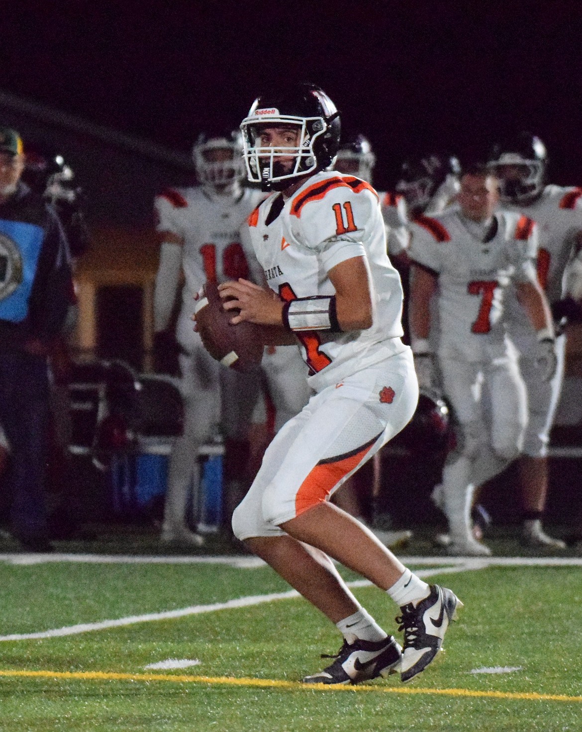 Cannon DeLong, a sophomore from the Tigers looks for an open teammate to pass to Friday night against the Jacks.