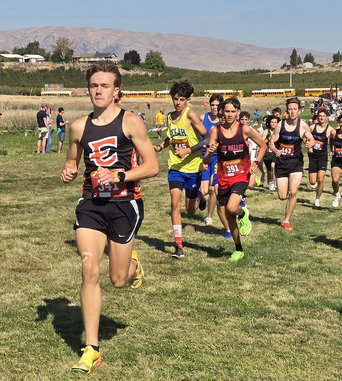 Ephrata junior Caleb Fitts rushes ahead of the group as he works to finish second in the Race Course Saturday.
