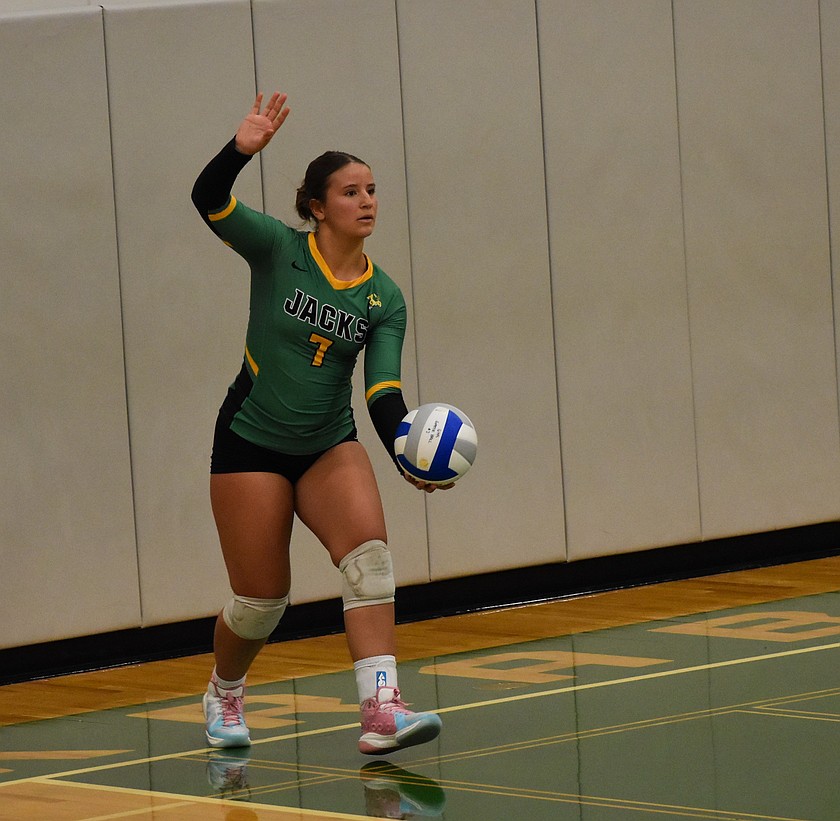 Quincy freshman Gabby Bergman steps up to serve the ball in their home matchup against Ephrata.