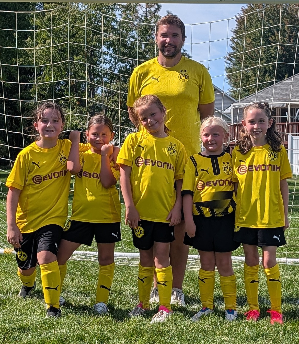 Courtesy photo
The BVB IA CDA 2018–2019 Girls (U8) soccer team, competing in the Eastern Washington Select League (EWSL) U8 Division 1, defeated Storm FC 7–0 on Saturday at Centennial Park in Cheney. Pictured is coach Ross Kuhn with players, from left, Taylor Vaughn, Vivien Bozinov, Jenna Jackman, Norah Tate and Kameron Biddle.