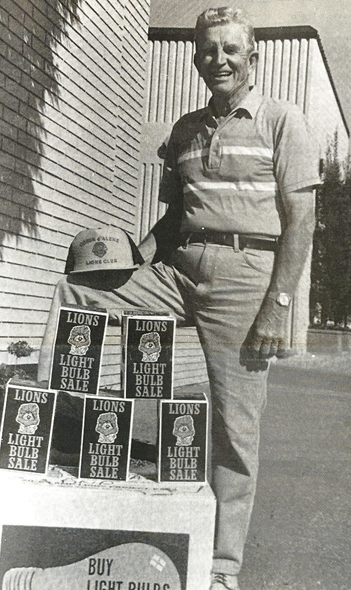 In 1991, Gil Yates, president of the Coeur d’Alene Lions Club, displayed light bulbs that his group sold door-to-door.
