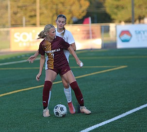 The Mavericks’ Peyton Ross (7) cuts off a Selah defender during their game Tuesday as she looks for an open teammate to advance the attack.