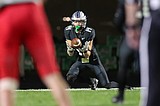 Pearson's 'coming-out party' — sophomore QB wins first varsity start, Van Leuven runs for four TDs for Timberwolves