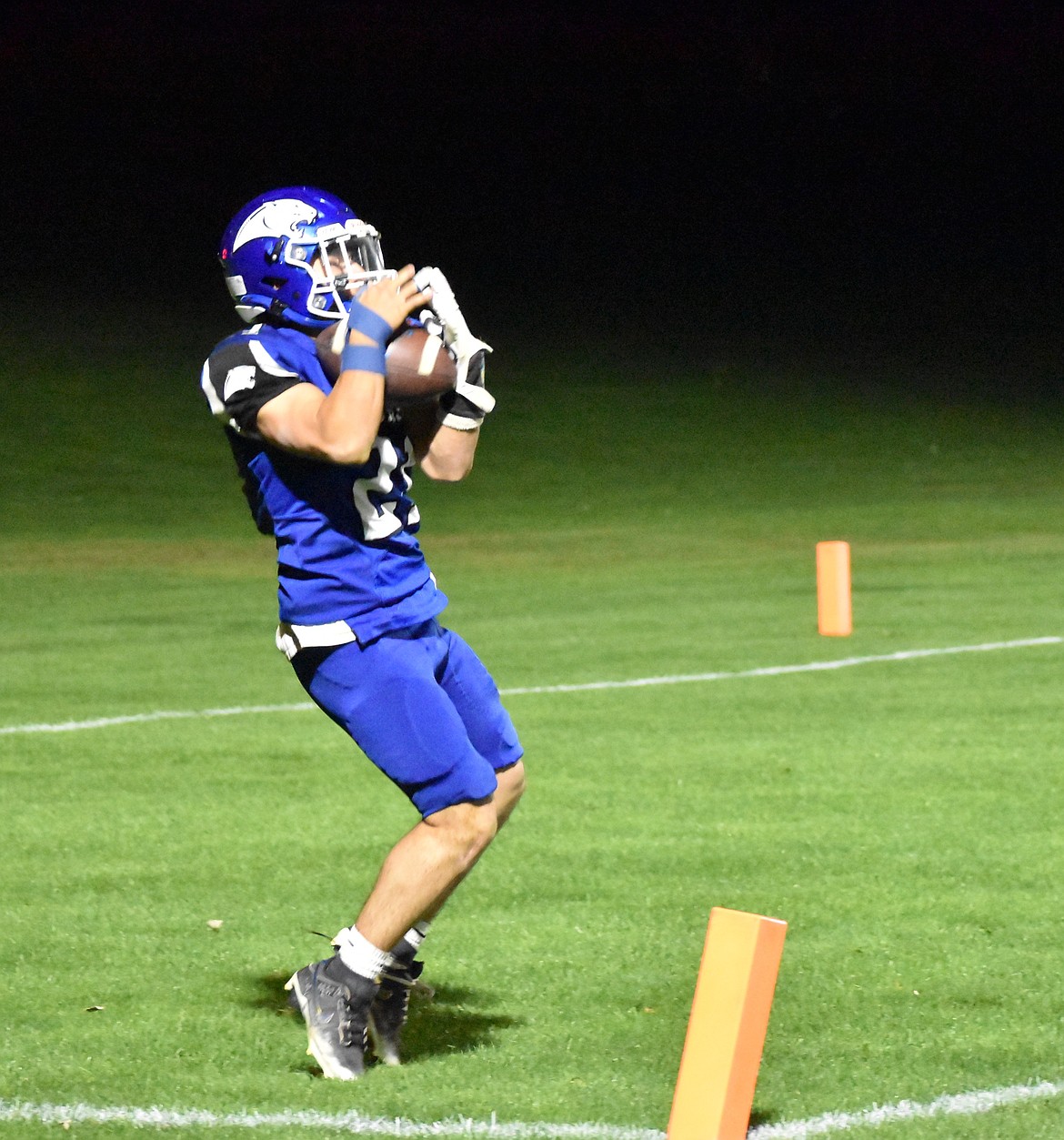 Danny Martinez, a senior for the Cougars, completes a catch in the endzone for a touchdown.