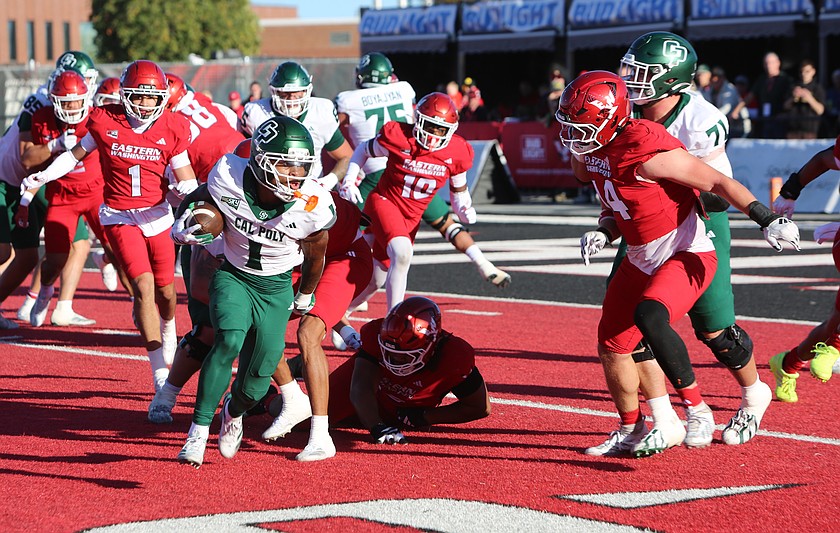 Cal Poly running back Jaden Green (1) slips tacklers from the Eagles defense. Cal Poly completed a fourth quarter comeback to defeat Eastern Washington 31-27 Saturday.