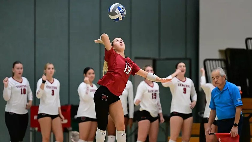 Brooklyn Parker from the Wildcats launches off a serve during Sunday's game against Saint Mary's.