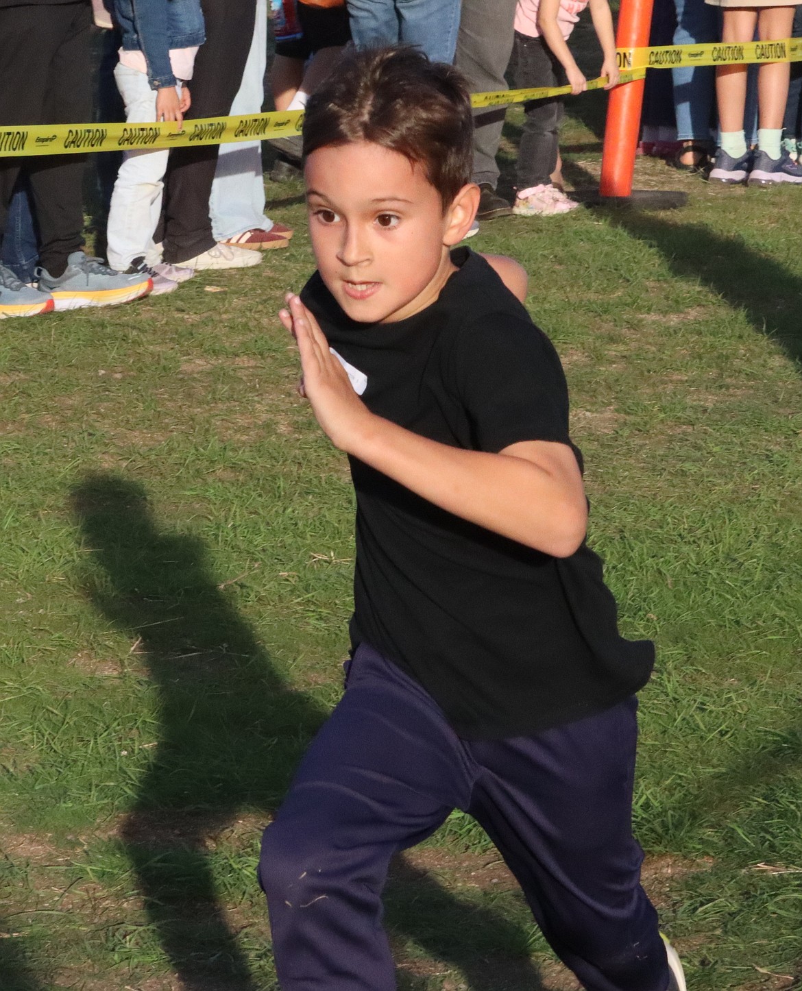 Atlas Elementary School third-grader Charlie Lawton has his eyes on the finish line.