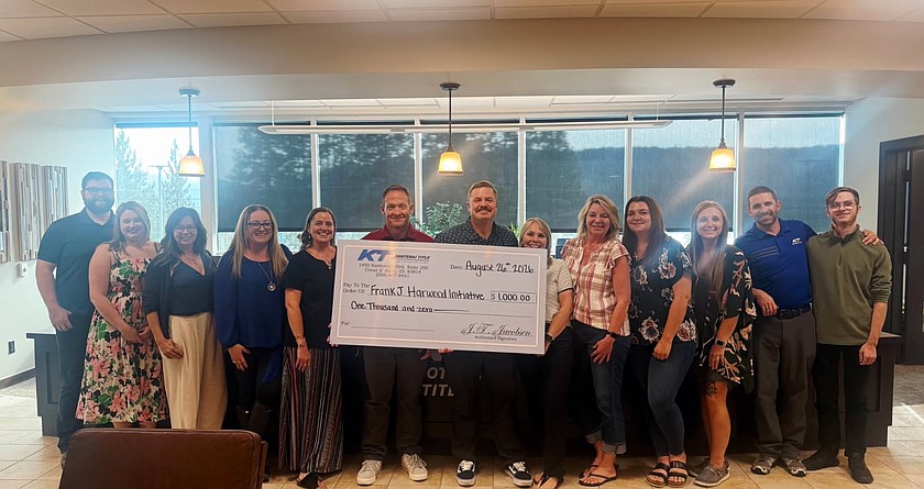 Kootenai Title’s $1,000 donation comes from a unique employee fundraising tradition. Each year, employees contribute $5 per week for the privilege of wearing jeans to work. Twice a year, employees select a nonprofit organization to receive the funds raised through the program. From left: Greg Sharar, Kindal, McMaster, Denise Potts, RaeAnne Capaul and Meagan Shields, Kootenai Title; Pete Holley and Kevin Lawler, FJH Initiative; Deborah Moore, Cindy VanSlate, Kalyn VanSlate, Winter Cunningham, Sam Johnson and Brian Johnson, Kootenai Title.