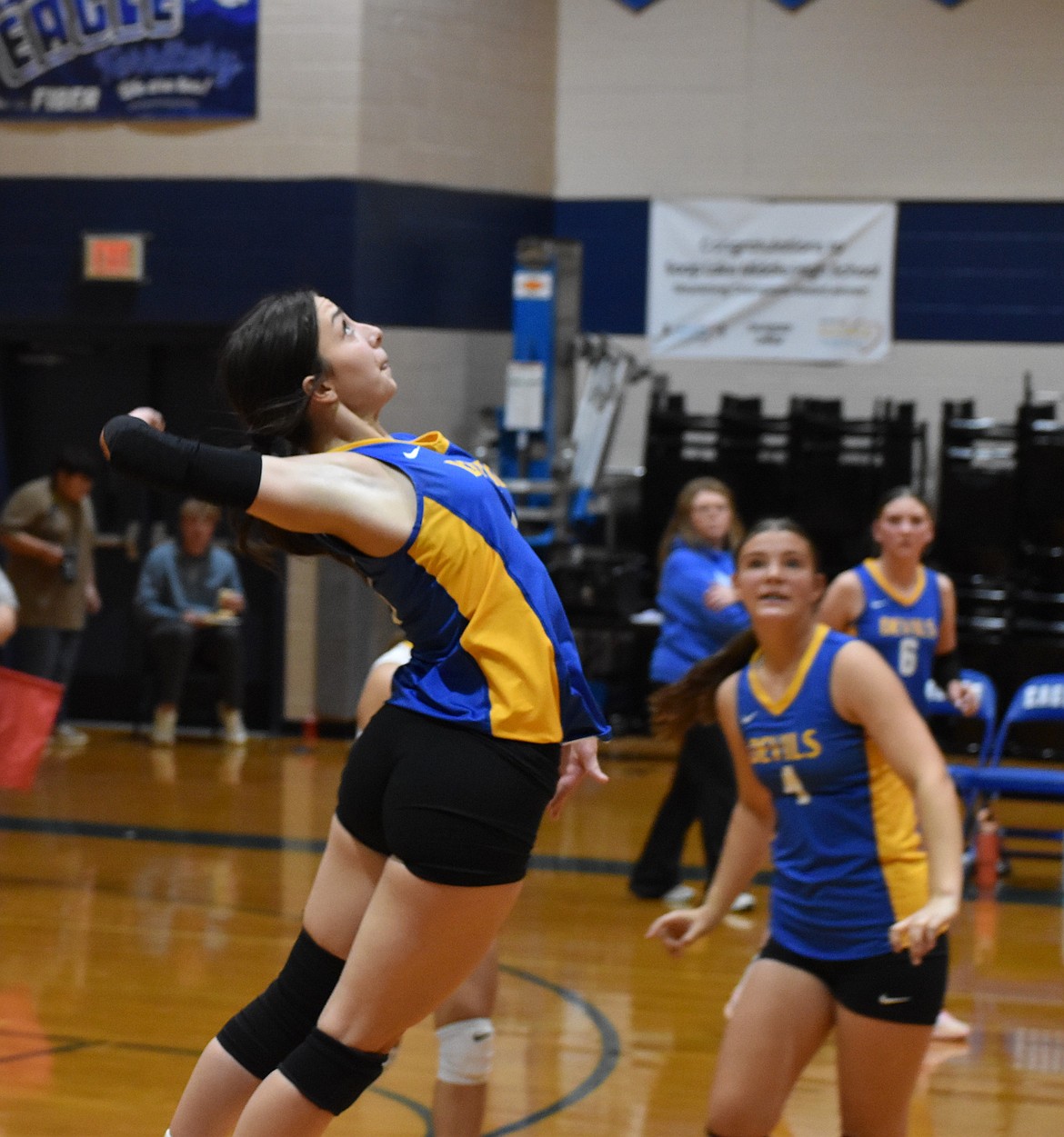 Cheyanne Daily from Wilson Creek leaps up to slam the ball over the net in Thursday’s game against Soap Lake.