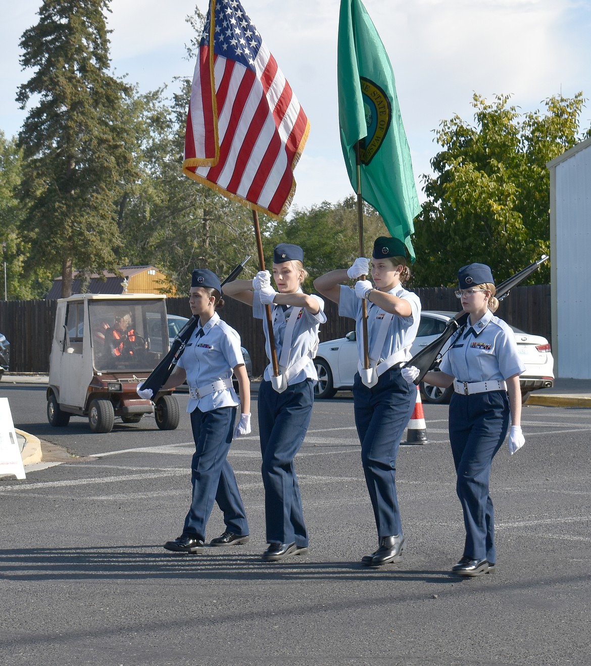 A color guard of cadets from the Civil Air Patrol leads the Harvest Festival parade Saturday morning in Wilson Creek.