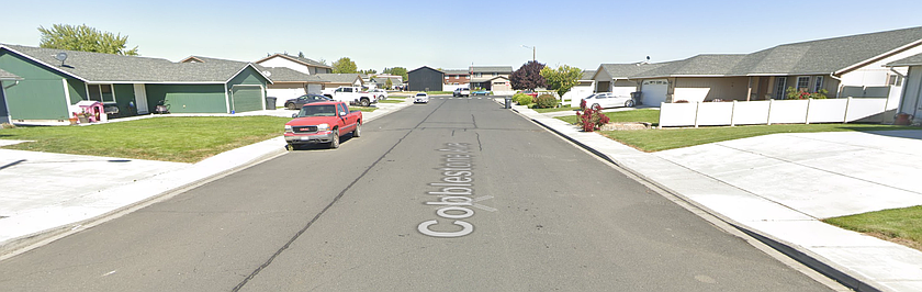 An Othello man was arrested Sunday after allegedly spraying graffiti at a residence on South Cobblestone Avenue.