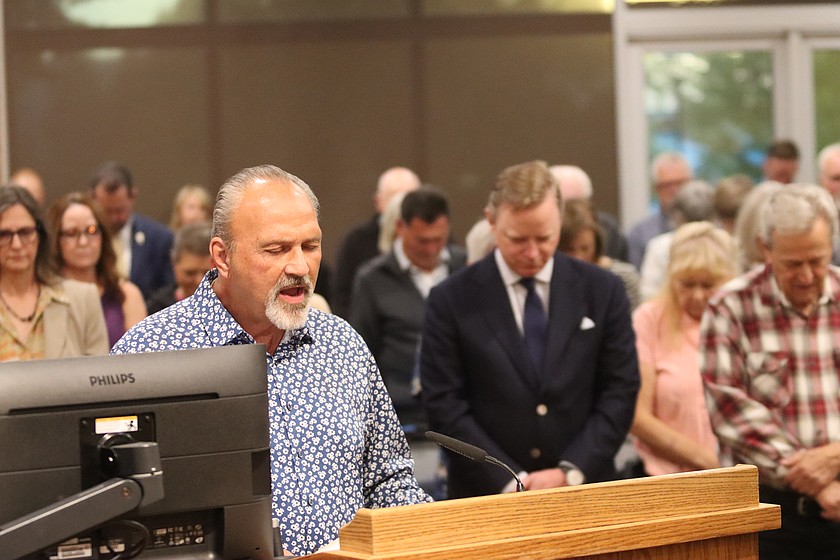 Pastor Paul Van Noy leads an invocation prayer at Coeur d'Alene City Council on Tuesday.