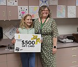 Fifth-grader at Fernan gives $500 trivia prize back to her school