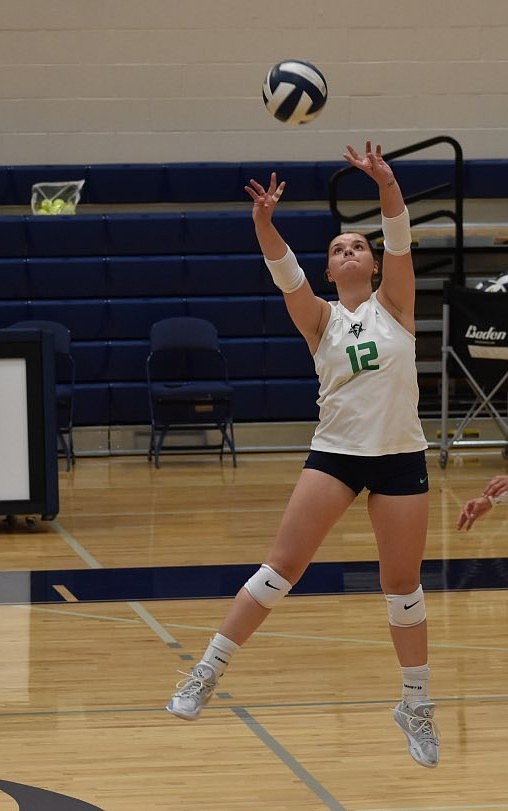 Paige Cochrane from Big Bend sets the ball for her teammates to send back toward Yakima Valley.