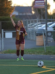 The Mavs’ Chelsea Gonzales (11) surveys the pitch as she attempts a corner kick earlier this season.