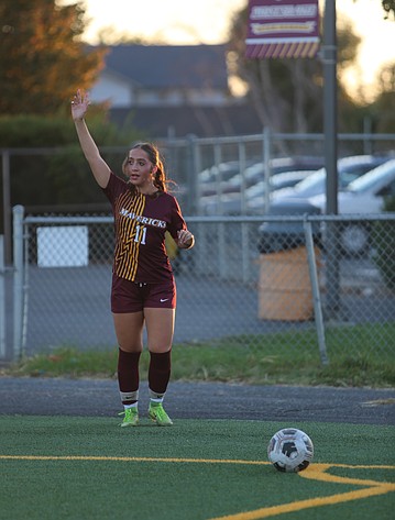 The Mavs’ Chelsea Gonzales (11) surveys the pitch as she attempts a corner kick earlier this season.