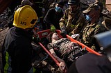 Strike on Ukrainian public buses leaves 30 dead as blackouts worsen in Kyiv
