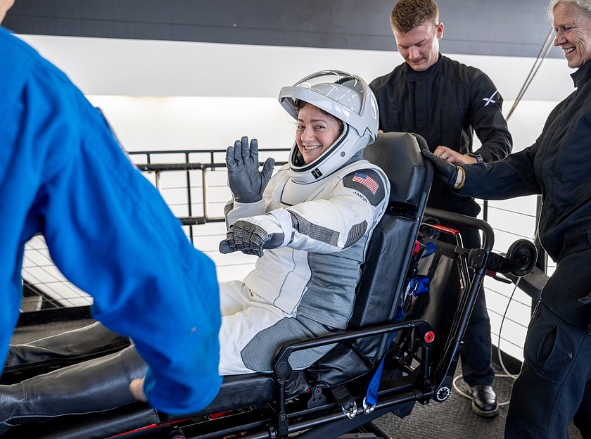 NASA astronaut Jessica Meir is helped out of the SpaceX Dragon Freedom spacecraft aboard the SpaceX recovery ship Shannon after splashdown in the Pacific Ocean off the coast of California, on Thursday, Oct. 8, 2026, returning from the International Space Station. (Keegan Barber/NASA via AP)