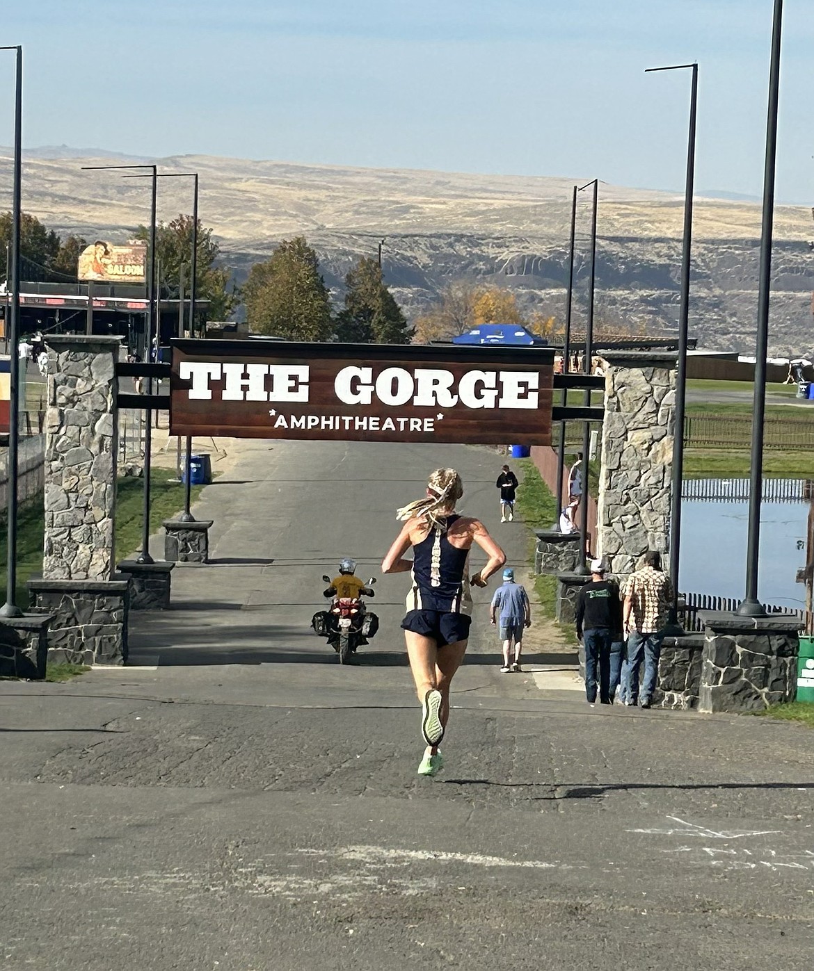 Courtesy photo
Timberlake senior Lola Eggleston prepares to run into the entrance of the Gorge Amphitheatre during Thursday's Live Nation Invitational in George, Wash. Eggleston won the race in 18:51.9.