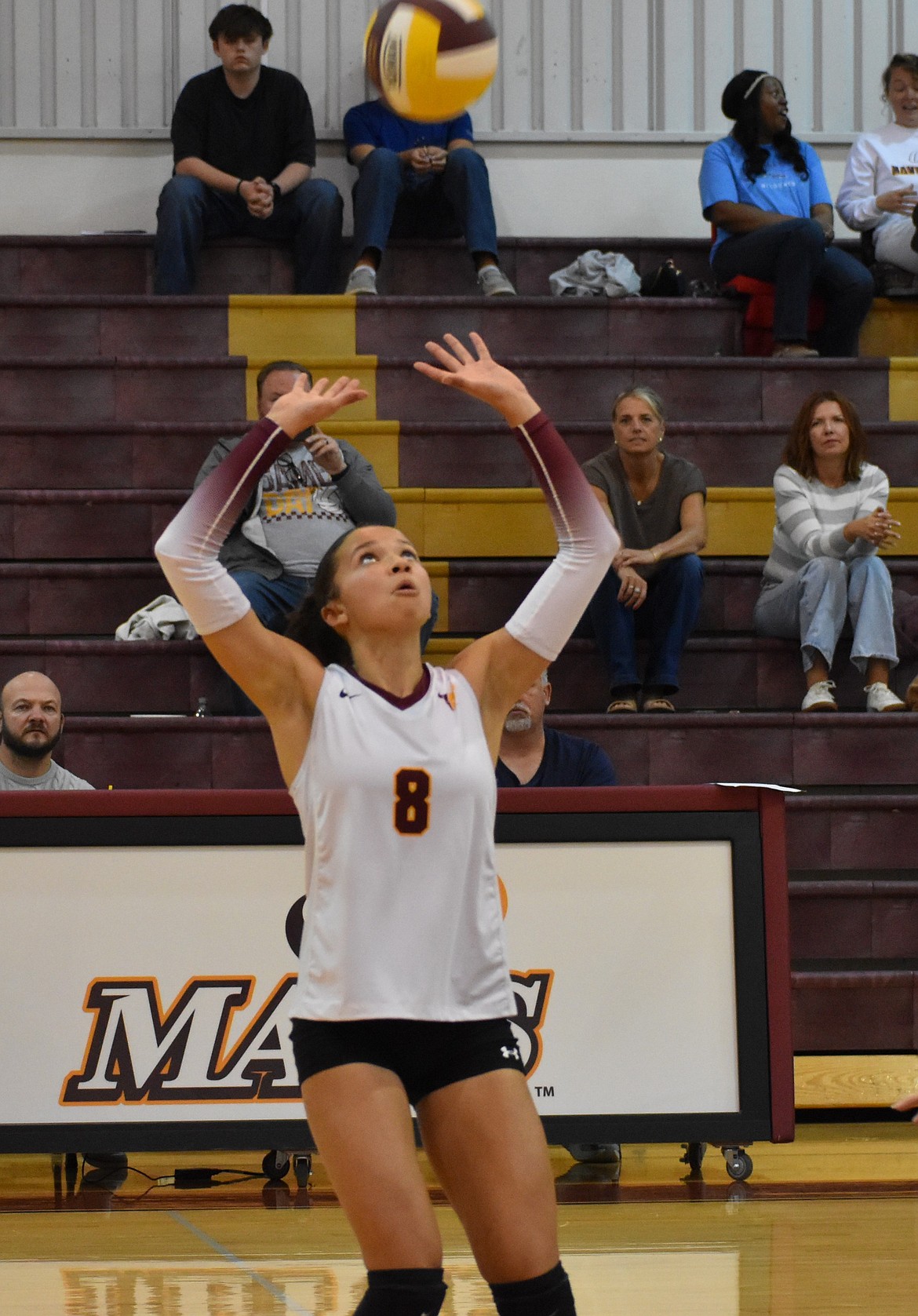 Allison Bond, a junior from the Mavericks, gets ready to set the ball for her teammates against Eastmont.
