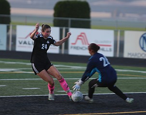 The Knights’ Lauren Wardenaar (24) boots the ball to score just before the goalkeeper could get there. Royal was victorious 9-0 over Wapato on Thursday.