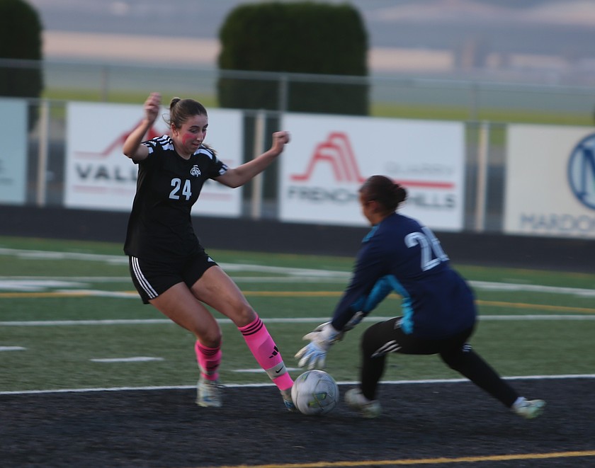 The Knights’ Lauren Wardenaar (24) boots the ball to score just before the goalkeeper could get there. Royal was victorious 9-0 over Wapato on Thursday.