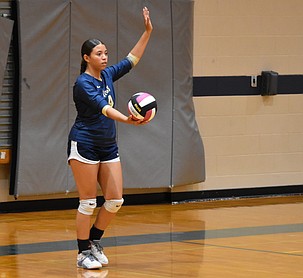 Zoey Ferguson, a sophomore from the Lions, steps up to serve during last week’s game against the Soap Lake Eagles. This week the Lions head to Liberty Christian Monday before returning home to host Pateros.