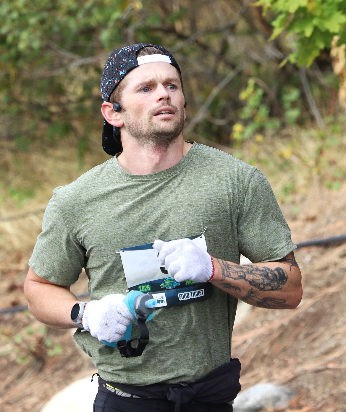 Joshua Rekittke of Coeur d'Alene closes in on the finish of the Hayden Lake Marathon Saturday. He completed the 26.2-mile course in 3:14:39.