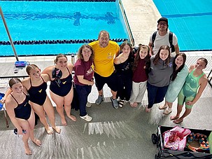 Members of the MLHS swim team gather for a team photo during the Mukilteo event in Federal Way.