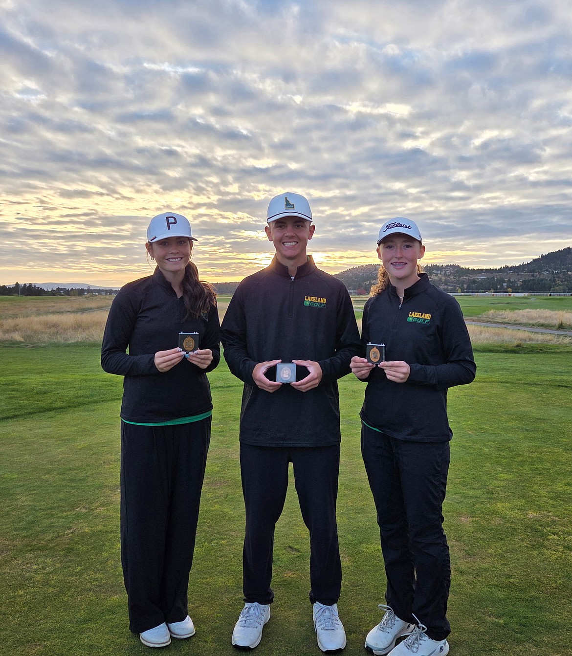 Courtesy photo
Lakeland High School had three state medalists (top 10 finishers) at the conclusion of the 5A tournament at the Links Golf Club in Post Falls. From left are Paige Carey (eighth), Luke Karshner (seventh) and Ellie Austad (sixth).