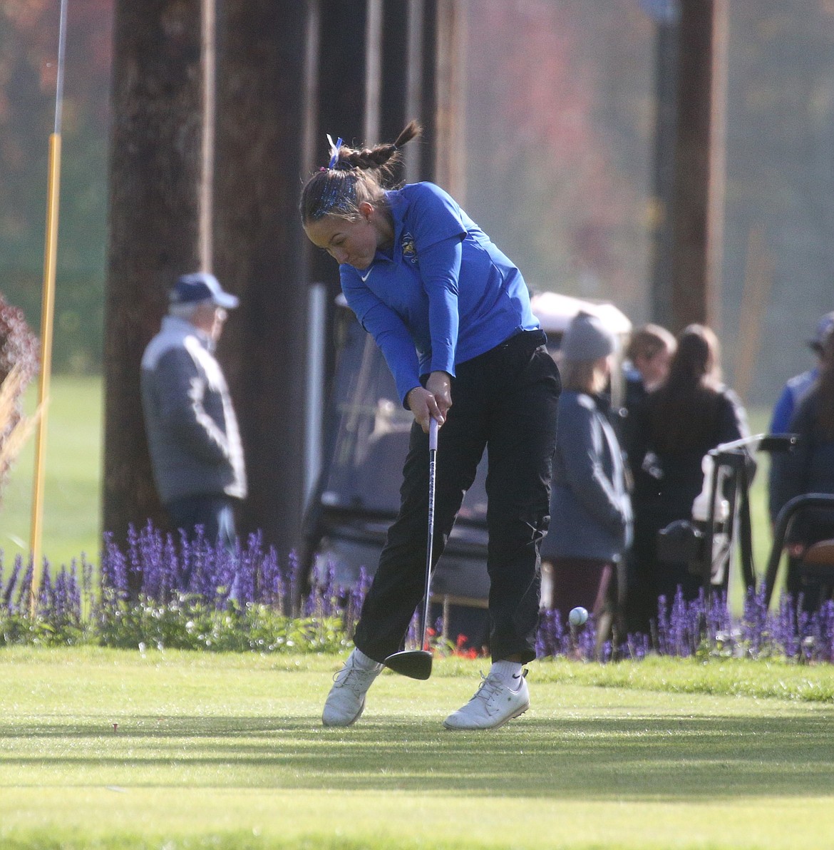 MARK NELKE/Press
Coeur d'Alene sophomore Emily Stillert hits her tee shot on the first hole Tuesday at the state 6A golf tournament at Avondale Golf Club in Hayden.