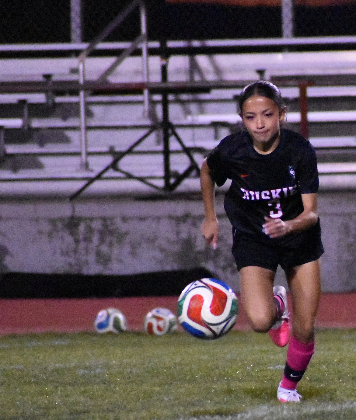 Othello junior Bella Garza rushes after the ball during Tuesday’s home game against Ephrata.